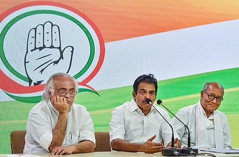 Congress leaders K. C. Venugopal, Digvijaya Singh and Jairam Ramesh address a press conference. (Photo | PTI)