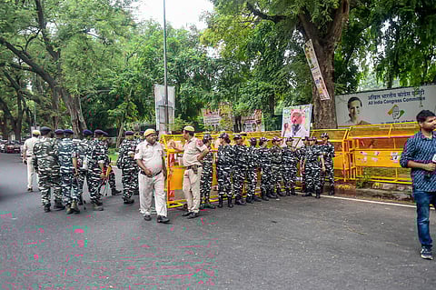 Security personnel outside AICC HQ, after the office of the Young Indian was sealed in the National Herald Case, in New Delhi, on August 3, 2022. (Photo | PTI)