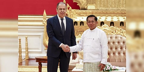 Myanmar State Administration Council Chairman Senior General Min Aung Hlaing, right, and Russian Foreign Minister Sergey Lavrov pose for a photo during their meeting in Naypyitaw, Myanmar.(Photo | AP)
