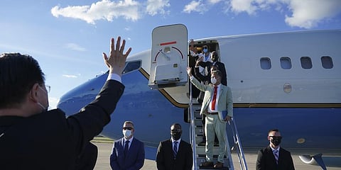 Photo released by Taiwan's Ministry of Foreign Affairs, Nancy Pelosi, top, and other members of her delegation wave as they prepare to leave Taipei.(Photo | AP)