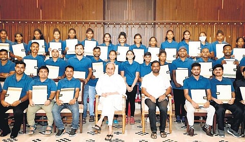 Naveen Patnaik with athletes at the Biju Patnaik Sports Award ceremony | Express