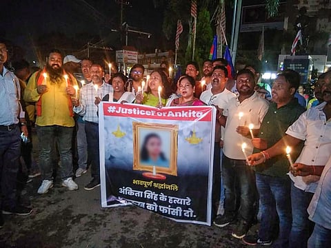 Members of Hindu organisation during candle light march in protest against the death of a class-12 student. (Photo | PTI)