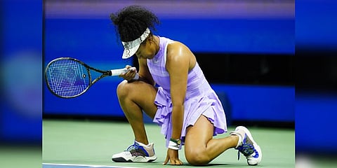 Naomi Osaka, reacts after missing a shot during a match against Danielle Collins, of the United States, at the first round of the US Open.(Photo | AP)