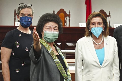U.S. House Speaker Nancy Pelosi is briefed by Chen Chu, the President of the Control Yuan and Chair of the National Human Rights Commission. (Photo | AP)