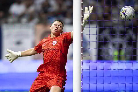 Chicago Fire goalkeeper Gabriel Slonina allows a goal to Vancouver Whitecaps' Lucas Cavallini during the second half of an MLS soccer match. (Photo | AP)