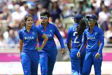 India's Renuka Singh, left, celebrates with teammates the dismissal of Pakistan's Ayesha Naseem during the women's cricket T20 preliminary round match between India and Pakistan. (Photo | AP)