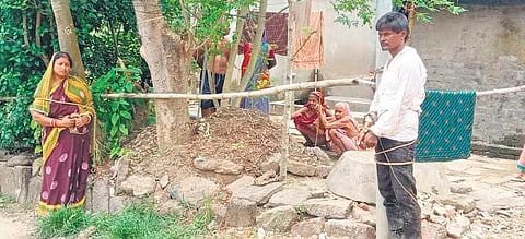 The woman and the youth tied up to a tree and a pole at Jagulleipada village. (Photo | Express)