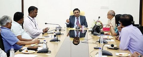 Indian Consul General in Vietnam Madan Mohan Sethi interacting with SOA functionaries on Thursday. (Photo | Express)