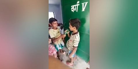 A video grab of Sarfaraz interviewing his classmates. (Photo | Twitter/ MaazAkhter800)A video grab of Sarfaraz interviewing his classmates. (Photo | Twitter/ MaazAkhter800)