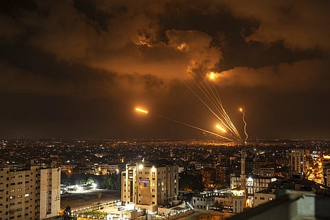 Rockets fired by Palestinian militants toward Israel, in Gaza City. (Photo | AP)