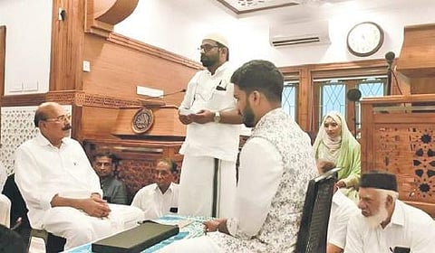 Bahja Dalil, the Kerala bride, witnessing her marriage at the mosque.