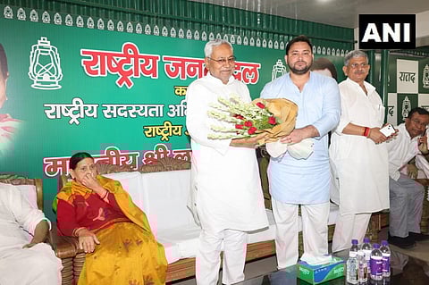 JU(U) leader Nitish Kumar along with RJD leader Tejashwi Yadav and Rabri Devi, on Tuesday. (Photo | ANI Twitter)