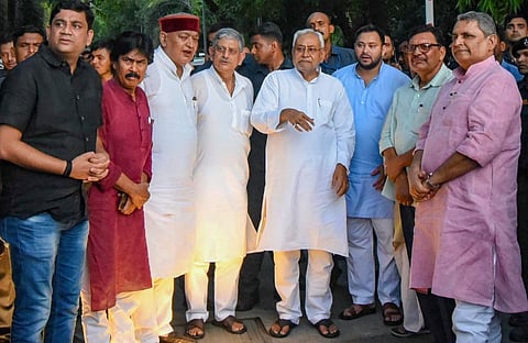 Janata Dal (United) leader Nitish Kumar with Rashtriya Janata Dal leader Tejashwi Yadav and others during a press conference, in Patna, Tuesday, Aug. 9, 2022. (Photo | PTI)