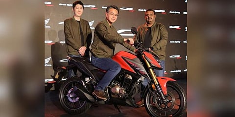 (L-R) Takashi Kobayashi, Drector –sales & marketing – HMSI; Atsushi Ogata, MD, President & CEO; P Rajagopi, operating officer, at the launch of CB300F