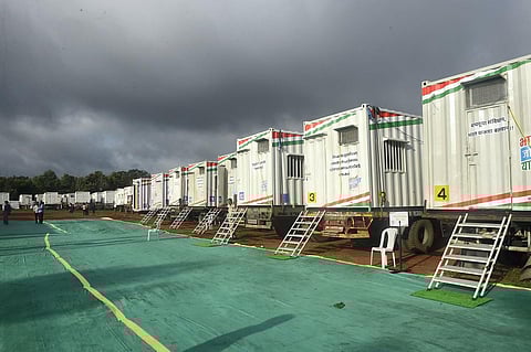 Containers, used by Congress 'padyatris' participating in the party's 'Bharat Jodo Yatra', mounted on trucks stationed in Nagercoil on Friday. (Photo | PTI)