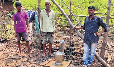 Villagers collecting water from the newly-installed pipeline at Sada village of Dediapada taluka in Jharkhand. (Photo | Express)