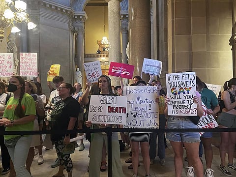 Abortion-rights protesters fill Indiana Statehouse corridors and cheer outside legislative chambers (Photo | AP)