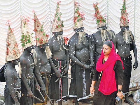 Artists of Peoples’ Centre and Library, Erenjikkal in Kasaragod, presenting their traditional folk art form, Alamikkali at Kanakakunnu Palace grounds | B P Deepu