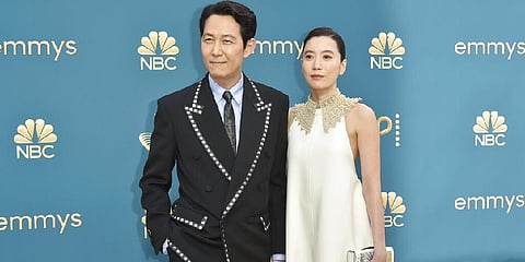 Lee Jung-Jae, left, and Lim Se Ryung arrive at the 74th Primetime Emmy Awards at the Microsoft Theater in Los Angeles. (Photo | AP)