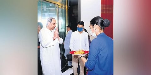 Chief Minister Naveen Patnaik being received after reaching Mumbai on Tuesday | Express
