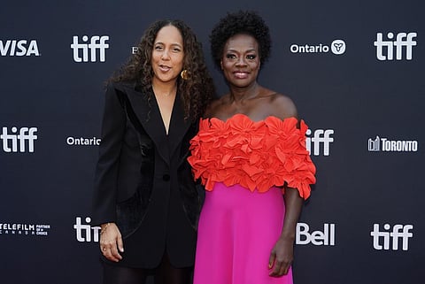Director Gina Prince-Bythewood, left, and Viola Davis attend the premiere for 'The Woman King' on day two of the Toronto International Film Festival, Sept. 9, 2022. (Photo | AP)