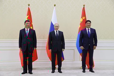China's President Xi Jinping, Russian President Vladimir Putin and Mongolia's President Ukhnaa Khurelsukh hold a trilateral meeting in Samarkand. (Photo | AFP)