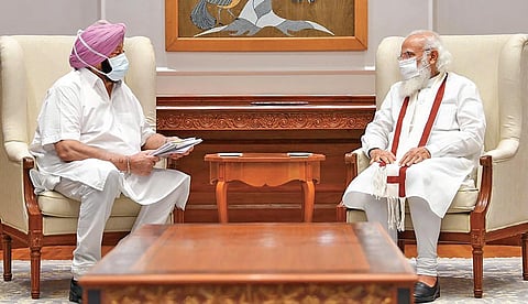 Punjab Chief Minister Capt Amarinder Singh during a meeting with Prime Minister Narendra Modi. (File Photo | PTI)