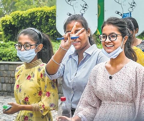 Students after writing CUET at North Campus in New Delhi on Friday. (Photo | PTI)