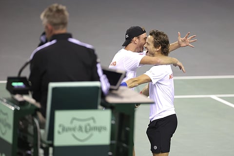 Netherlands' Wesley Koolhof, right, celebrates victory with Matwe Middelkoop (Photo | AP)