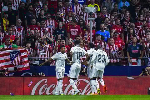Real Madrid's Rodrygo, left, celebrates with teammates after scoring the opening goal. (Photo | AP)