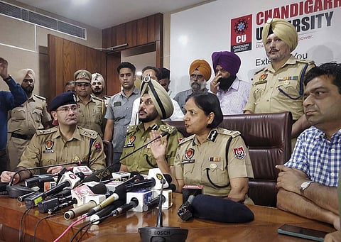 Inspector General of Police Gurpreet Deo with senior police officers addresses a press conference after objectionable videos of several women students were allegedly posted on social media. | PTI