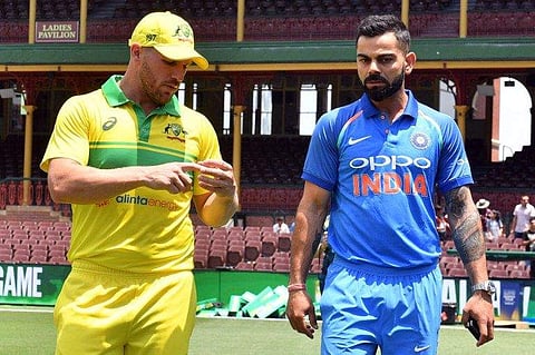 Australian skipper Aaron Finch(L) and Virat Kohli (File Photo | AFP)