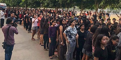 Students stage a protest over objectionable videos of several women students were allegedly recorded by a hosteller, at Chandigarh University. (Photo |PTI)