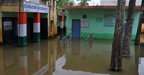 A view of the government school which stands flooded due to the recent rain in Ramanagara. (Photo | Vinod Kumar T)