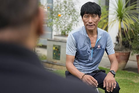 Veteran climber Sanu Sherpa speaks with the Associated Press in Kathmandu, Nepal, Friday, Sept. 2, 2022. (Photo | AP)
