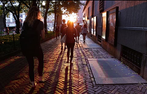 In this representational image, a member of the Indian Dawoodi Bohra community, walks along a sidewalk. (File Photo | AP)