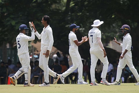 Sai Kishore celebrates the dismissal of Sarfaraz Khan at the SNR College Grounds in Coimbatore on Wednesday | S Senbagapandiyan