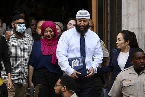 Adnan Syed, center right, leaves the courthouse after the hearing, Monday, Sept. 19, 2022, in Baltimore. (Photo | AP)