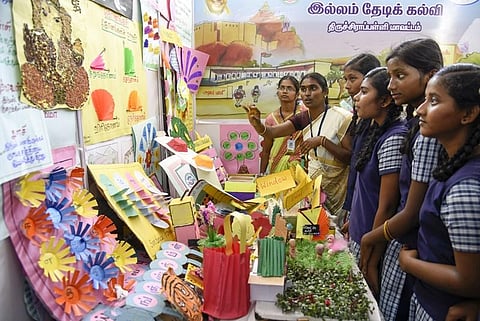 School students at the 'Illam Thedi Kalvi' stall at Tiruchy book fair on Wednesday | M K Ashok Kumar