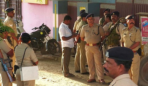 NIA officials are seen conducting search in a house of a functionary belonging to Popular Front of India party at Ukkadam in Coimbatore on Thursday. (Photo | EPS)