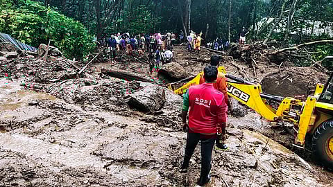 File photo of rescue operations underway after a landslide triggered by heavy rains during ongoing monsoon season, at aKanjar village in Kerala's Idukki district, Monday. (Photo | PTI)