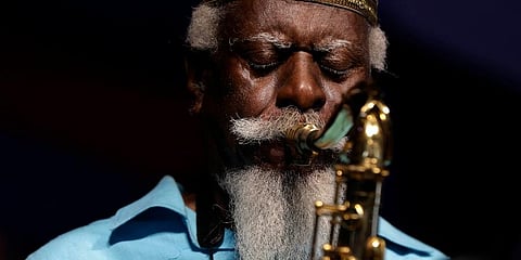 Jazz saxophonist Pharoah Sanders performs at the New Orleans Jazz and Heritage Festival in New Orleans, Friday, May 2, 2014. (AP File photo)