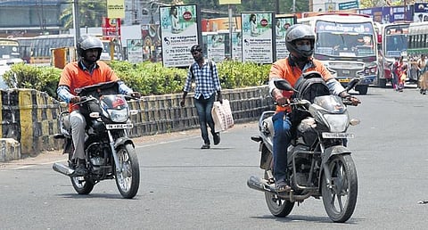 The delivery agents called the new pay structure exploitative, and said it removes their cash-based incentives. File photo of Swiggy delivery agents in Tiruchy | Express