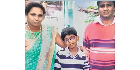 Siddharth Pilli along with his parents