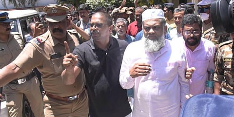 Popular Front of India (PFI) members Yahiya Thangal, Karamana Asharaf Maulavi and PK Usman after being produced before a court. (Photo | PTI)