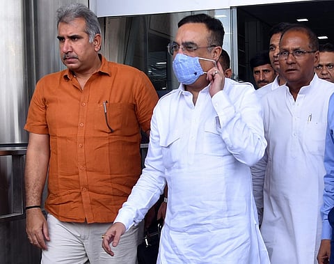 Senior Congress leader Ajay Maken arrives to attend a Congress Legislative Party (CLP) meeting in Jaipur on Sunday. (Photo | PTI)