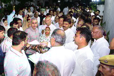 Congress MLAs leave for the residence of Rajasthan Assembly Speaker CP Joshi for a meeting, in Jaipur on Sunday. (Photo | PTI)