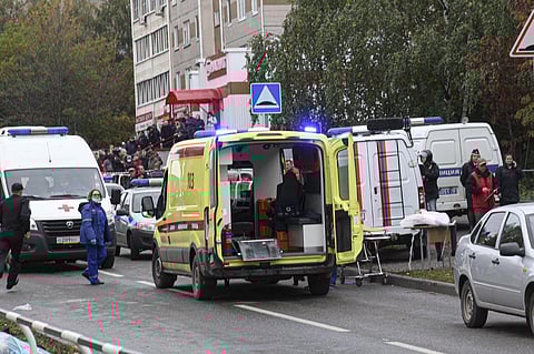 Police and paramedics work at the scene of a shooting at school No. 88 in Izhevsk, Russia. (Photo | AP)