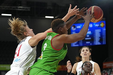 Serbia's Mina Dordevic, left, and Mali's Salimatou Kourouma compete for a loose ball during their game at the women's Basketball World Cup in Sydney, Australia. (Photo | AP)
