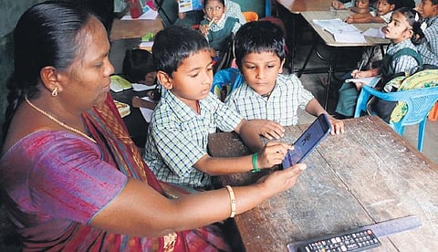 Students attending the first term exam online with teacher’s support at CSI primary school in Coimbatore | S Senbagapandiyan